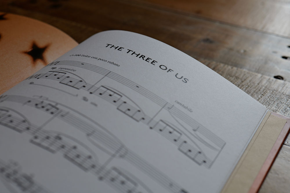 Sheet music open at The Three Of Us